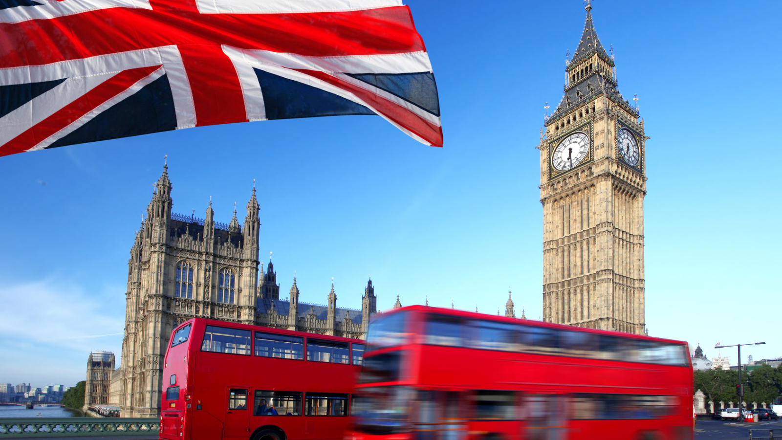 Big Ben with city bus and flag of England, London